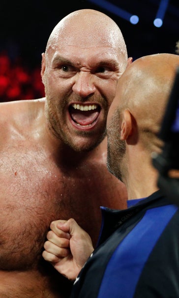 Tyson Fury stays unbeaten, stops Tom Schwarz late 2nd round